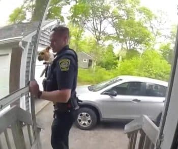 Heroic Police Officer Bravely Rescues Puppy From Fiery Flames in Heartwarming Act of Courage